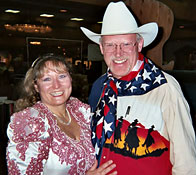 Ron Wilson, Cowboy Poet Lariat, poses with Diamond-Tooth Lill. 